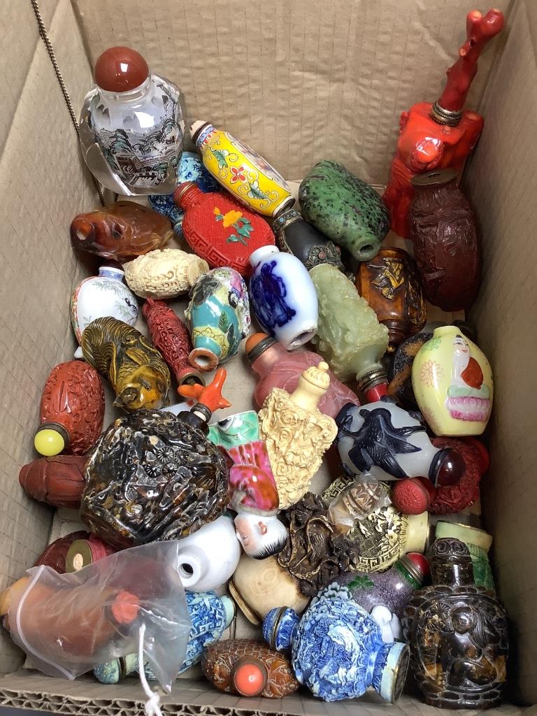 A group of approximately forty Chinese snuff bottles